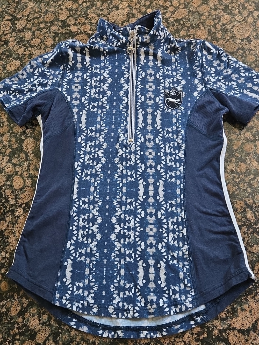 Blue Short Sleeve Half-Zip Athletic Top with White Pattern